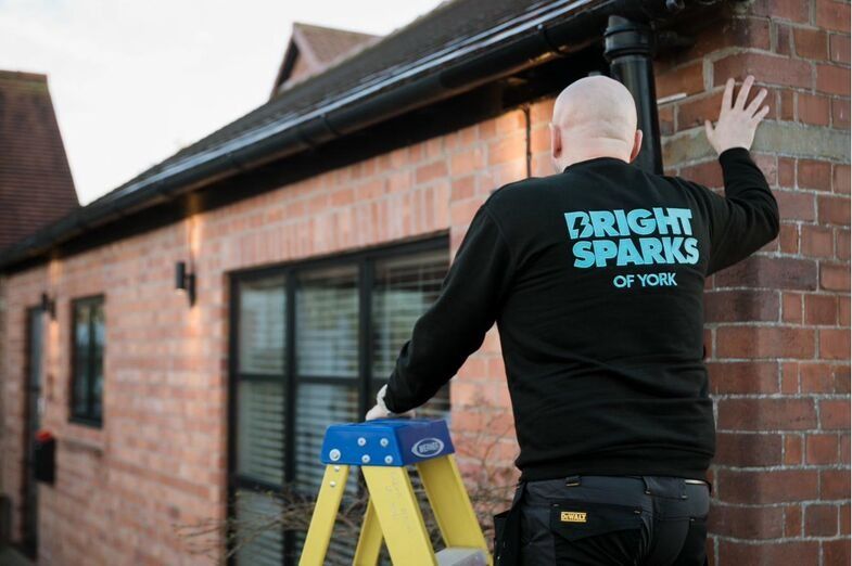 Bright Sparks branded workwear on site