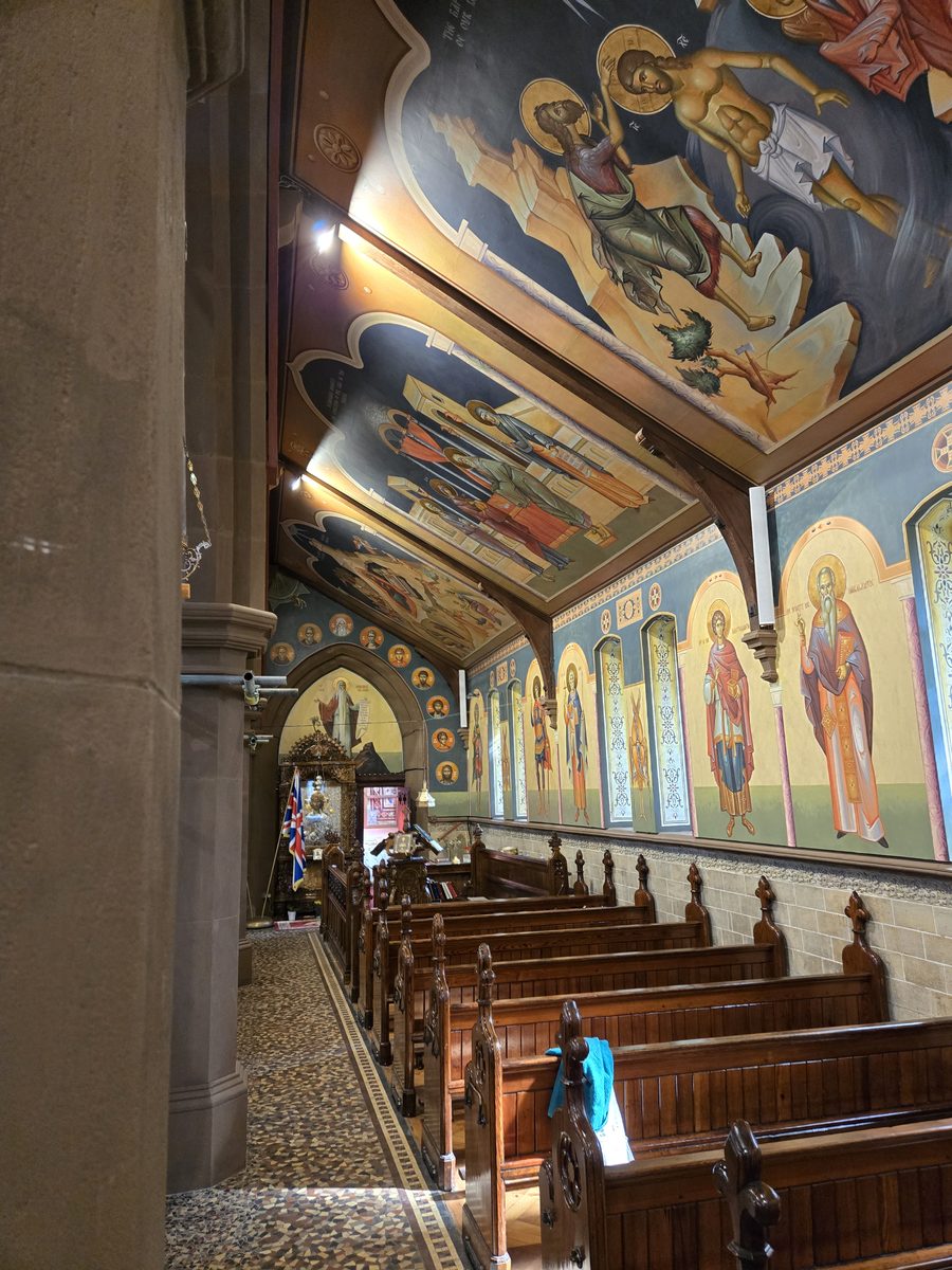 Church interior with specialist lighting showing full detail of hand-painted murals
