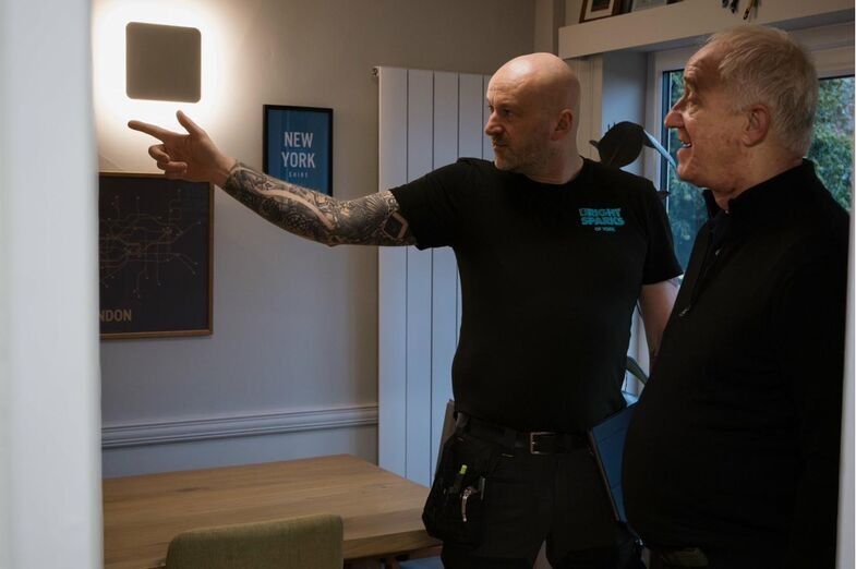 Discussing electrical work with a customer