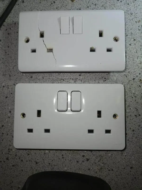 Side-by-side comparison: cracked LAP socket on the left, new Hager replacement socket on the right
