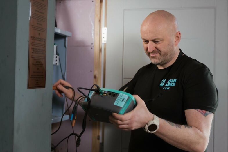 Calibrated test equipment carrying out an EICR on a York rental property